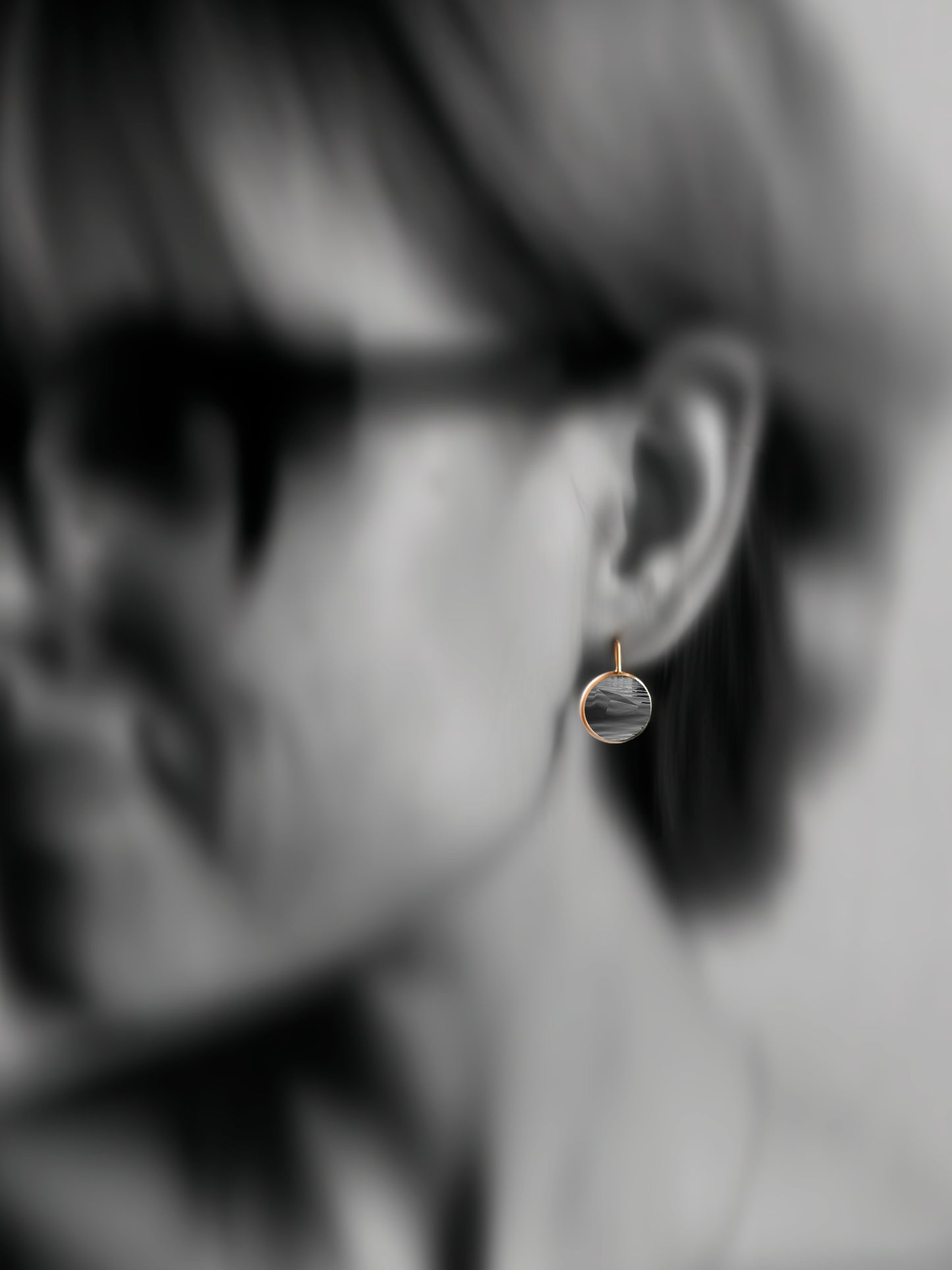 “Floating” earrings